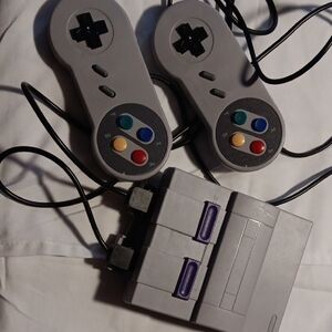 Retro Gray Gaming Console with Dual Controllers